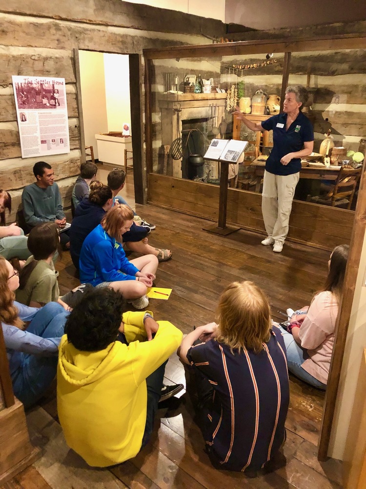 Seniors learn about life during the 19th century from Museum Educator Judy Costello
